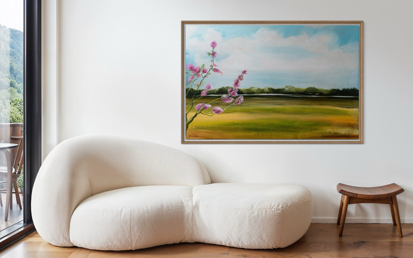 Field with a pink tree